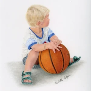 Realistic drawing of little boy sitting on ground with hands on a basketball looking into the distance. By Alberta artist Rochelle Colgan