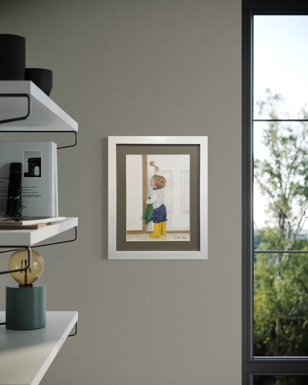 Framed realistic drawing of a 2 year old boy with bright yellow rubber boots pulling down the handle to open a door to the outside, hanging on a wall. By Alberta artist Rochelle Colgan