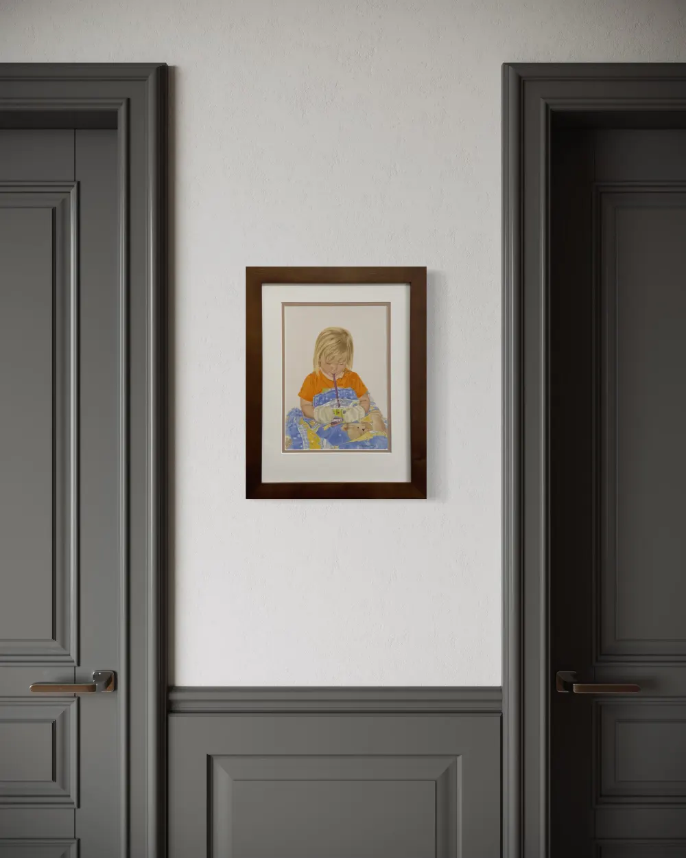 Framed realistic drawing of a three year old girl drinking a slurpee while wearing mittens and covered up with a blanket, hanging on a wall. By Alberta artist Rochelle Colgan
